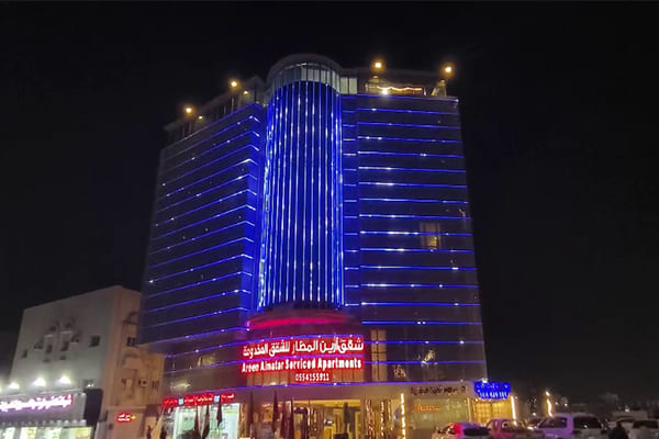 A building facade with dynamic colorful lighting
